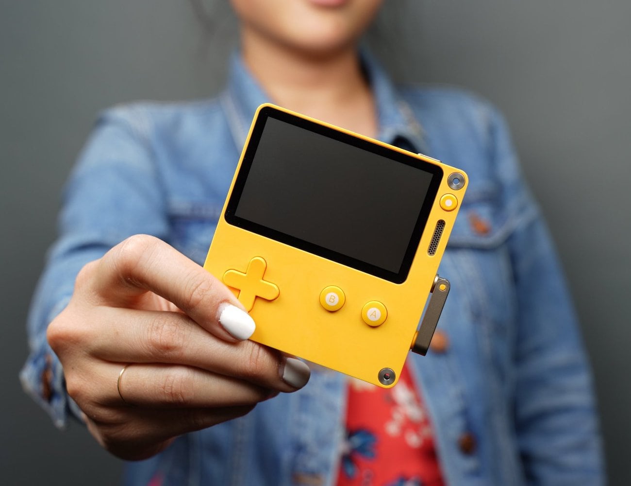 Playdate Handheld Gaming System comes with 12 unique video games and a hand crank